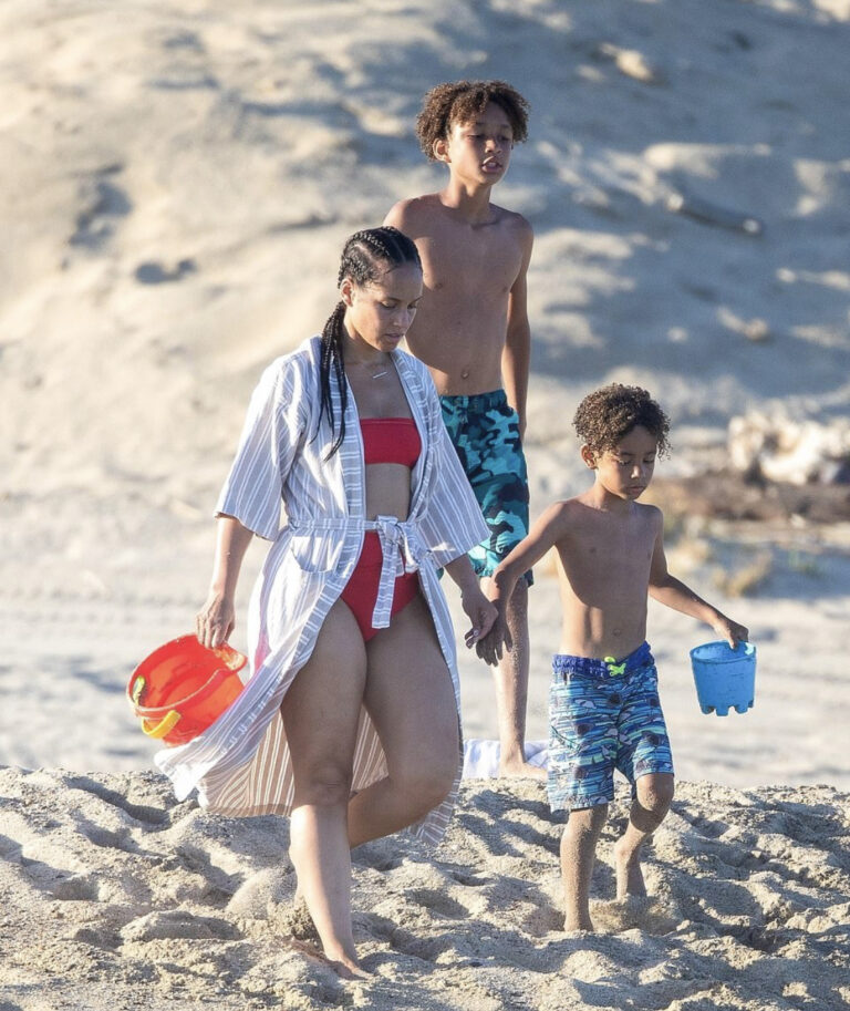 Alicia Keys shows off her abs in a red bikini while on vacation with family