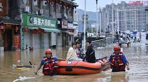 China floods leave at least 12 dead, with thousands evacuated