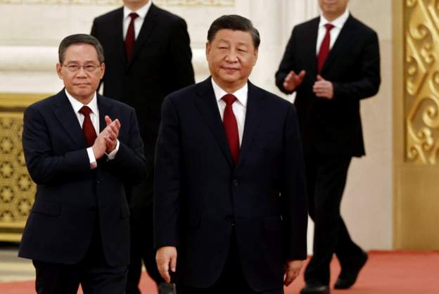 Xi Jinping announces third term in power and new top team