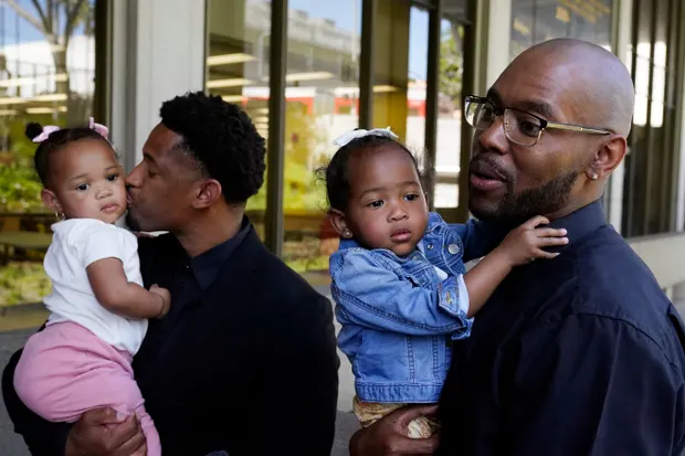 ‘It’s finally over’: two men set free after wrongly serving 17 years in prison