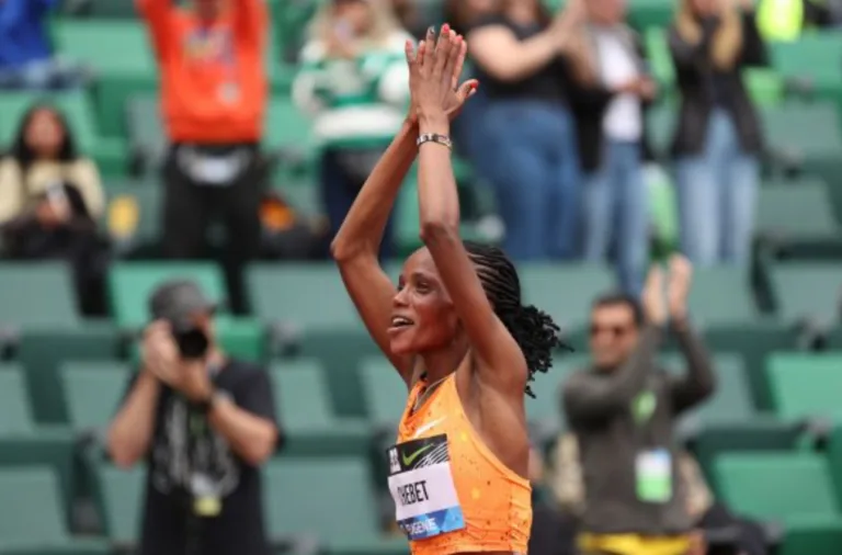 Chebet breaks world 10,000m record with 28:54.14 in Eugene
