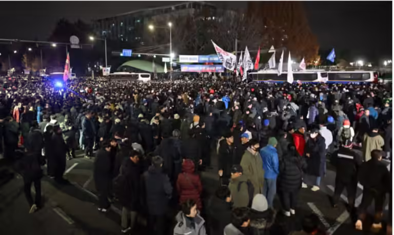 Martial law will stay in place until South Korean president lifts it, military officials say