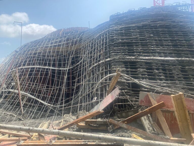 14 workers rescued after three-storey building collapses at Roman Ridge